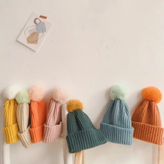 Invierno mujer niños Unisez tejido cálido logotipo personalizado OEM y ODM gorro teñido liso con POM POM